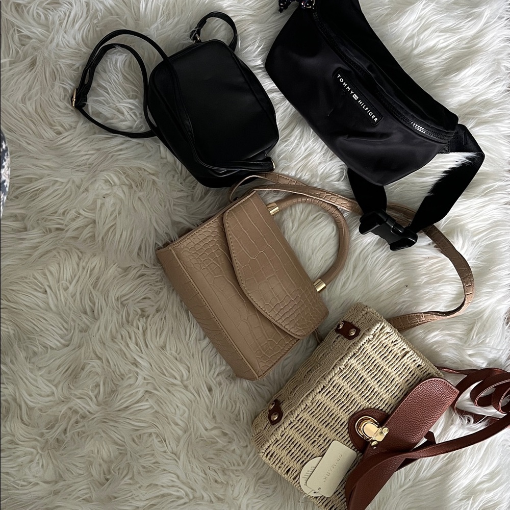 1 Tommy Hilfiger Black waist pack 
2 Tan Mini Bags
1 small cross body purse